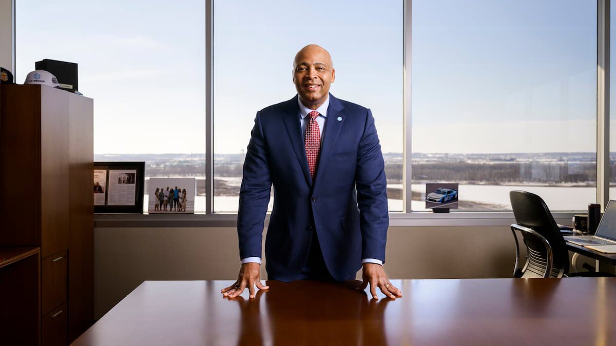 Dave Bozeman, C.H. Robinson CEO standing behind desk
