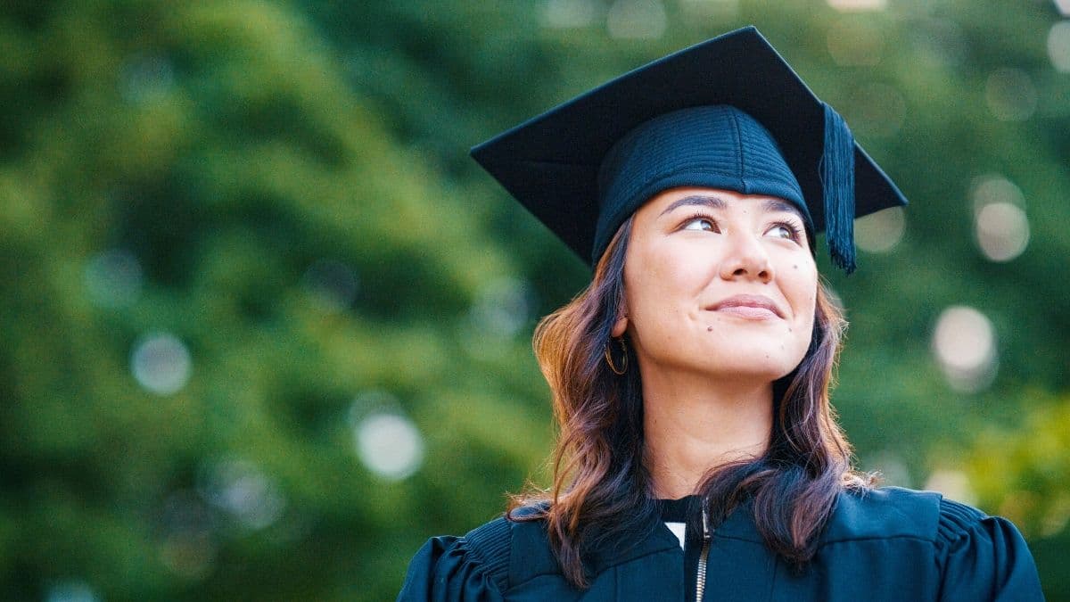 Female graduate in cap and gown | C.H. Robinson Scholarships