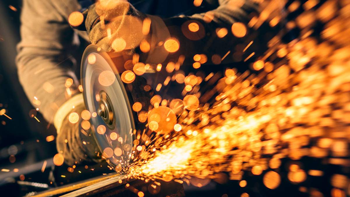 Power saw cutting metal and sparking effects in lighting